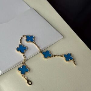 Van Cleef & Arpels Gold Bracelet with Blue Clover Charms